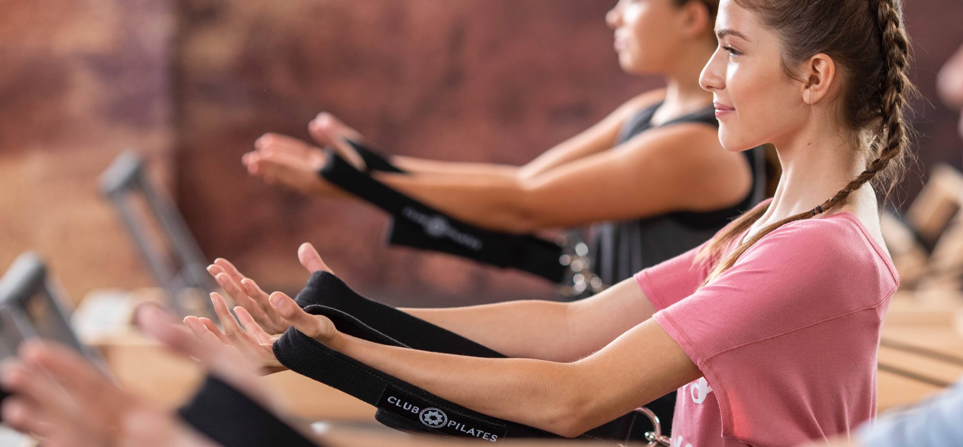 Two people using resistance bands