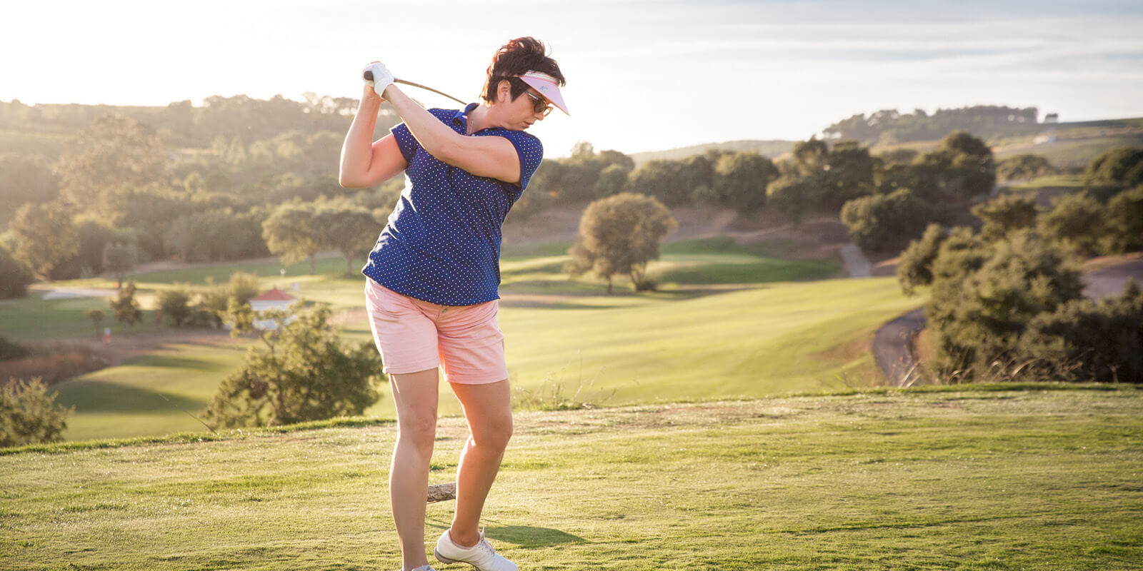 Person playing golf